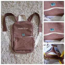 Mochila em suede. Forro material sintético.
